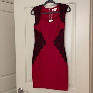 Beautiful red midi dress with black lace details. NWT